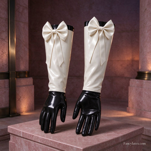 Pair of ivory and black latex long gloves with ivory satin bow cuffs